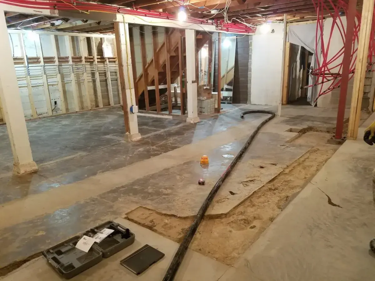 Before: Basement Floor Leveling — Twin Cities, MN
