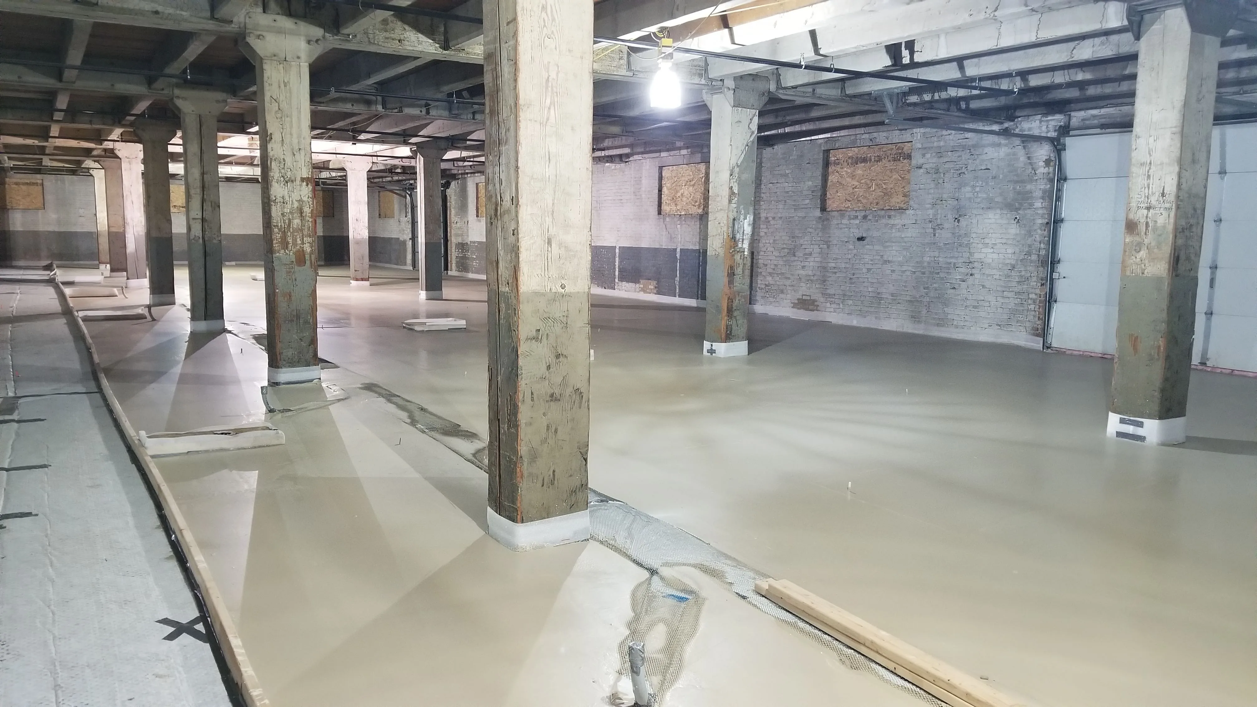 Large commercial underlayment installation around structural columns
